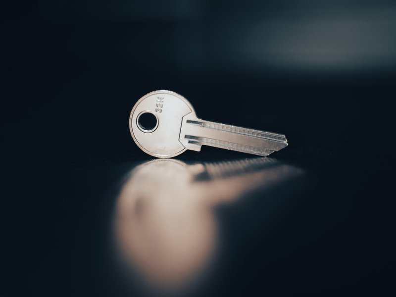 a close up of a key on a table