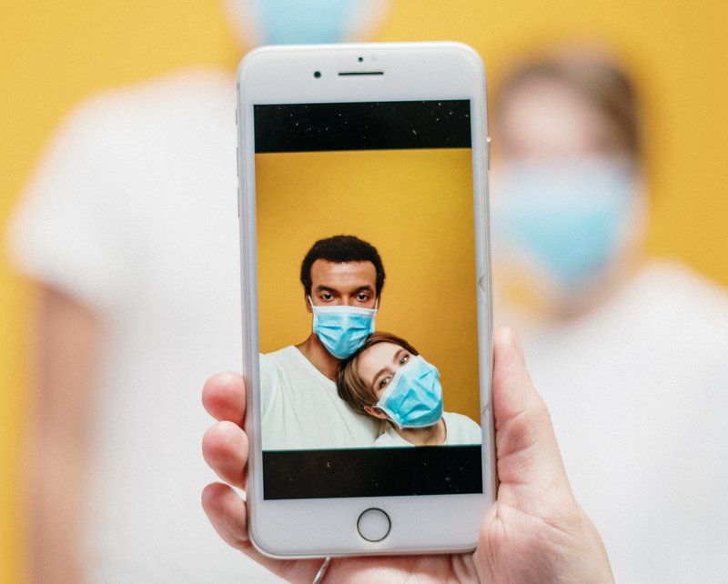 photo of a couple wearing masks