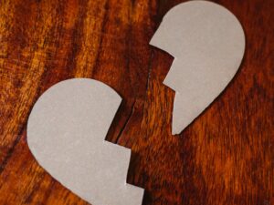 Broken Heart: Photo by RDNE Stock project: https://www.pexels.com/photo/broken-heart-cardboard-on-brown-wooden-table-top-6670068/